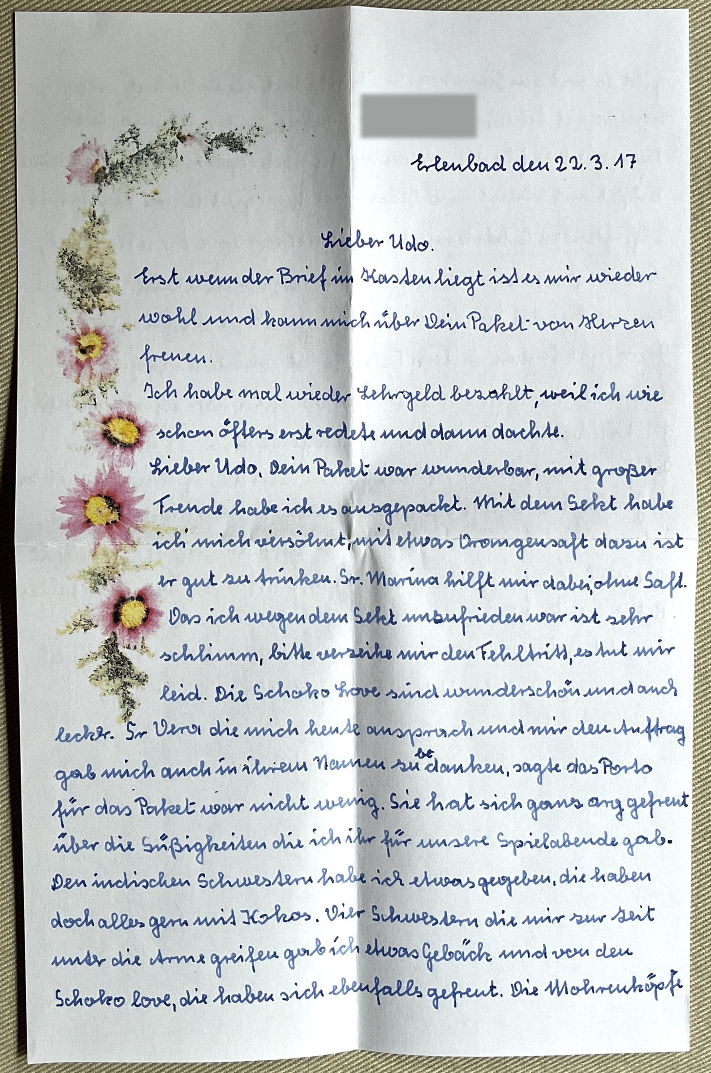 Erste Seite mit gemalter Blumenranke, Handschrift