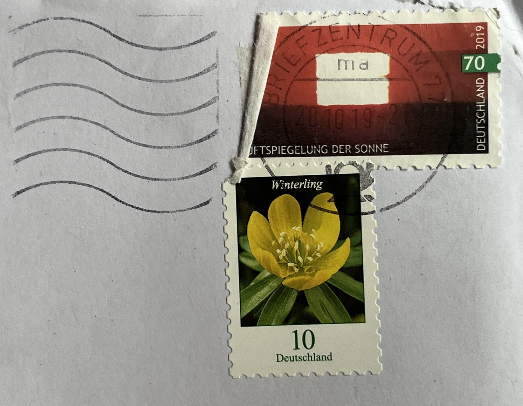 Umschlag: Briefmarken Luftspiegelung der Sonne und Winterling, Poststempel vom 28. 10. 2019